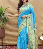 Aqua blue paithani silk blend saree with peacock floral border & rani pink blouse