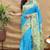 Aqua blue paithani silk blend saree with peacock floral border & rani pink blouse