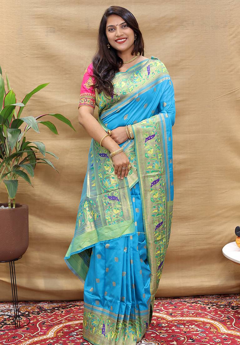 Aqua blue paithani silk blend saree with peacock floral border & rani pink blouse