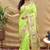 Lime green paithani silk blend saree with peacock floral border & rani pink blouse