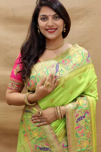 Lime green paithani silk blend saree with peacock floral border & rani pink blouse