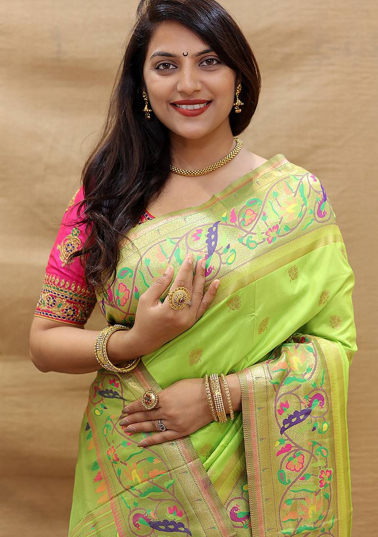 Lime green paithani silk blend saree with peacock floral border & rani pink blouse