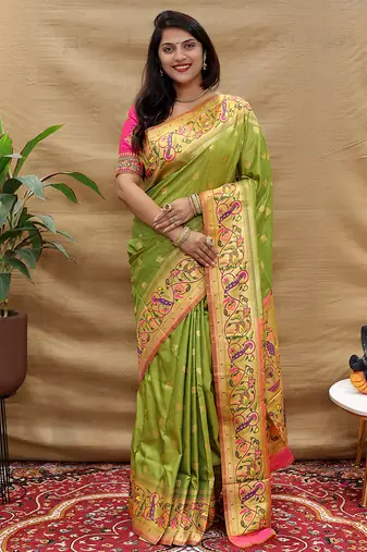 Mehendi green paithani silk blend saree with peacock floral border & rani pink blouse