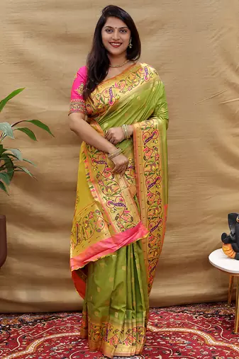 Mehendi green paithani silk blend saree with peacock floral border & rani pink blouse