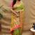 Mehendi green paithani silk blend saree with peacock floral border & rani pink blouse