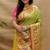 Mehendi green paithani silk blend saree with peacock floral border & rani pink blouse