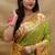Mehendi green paithani silk blend saree with peacock floral border & rani pink blouse