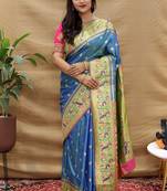 Royal blue paithani silk blend saree with peacock floral border & rani pink blouse