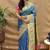 Royal blue paithani silk blend saree with peacock floral border & rani pink blouse