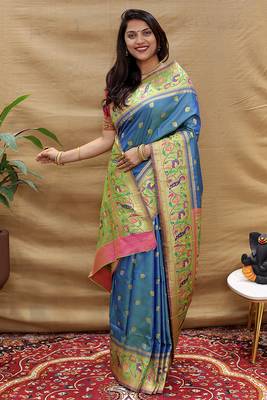 Royal blue paithani silk blend saree with peacock floral border & rani pink blouse 2