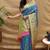 Royal blue paithani silk blend saree with peacock floral border & rani pink blouse