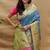 Royal blue paithani silk blend saree with peacock floral border & rani pink blouse