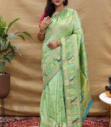 Mint green paithani silk blend saree with peacock floral border & rani pink blouse