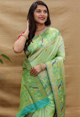 Mint green paithani silk blend saree with peacock floral border & rani pink blouse 3