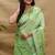 Mint green paithani silk blend saree with peacock floral border & rani pink blouse