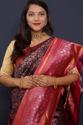 Navy blue banarasi silk blend saree with pink zari border & woven pallu