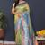 Light green banarasi silk blend saree with sky blue zari border & woven pallu