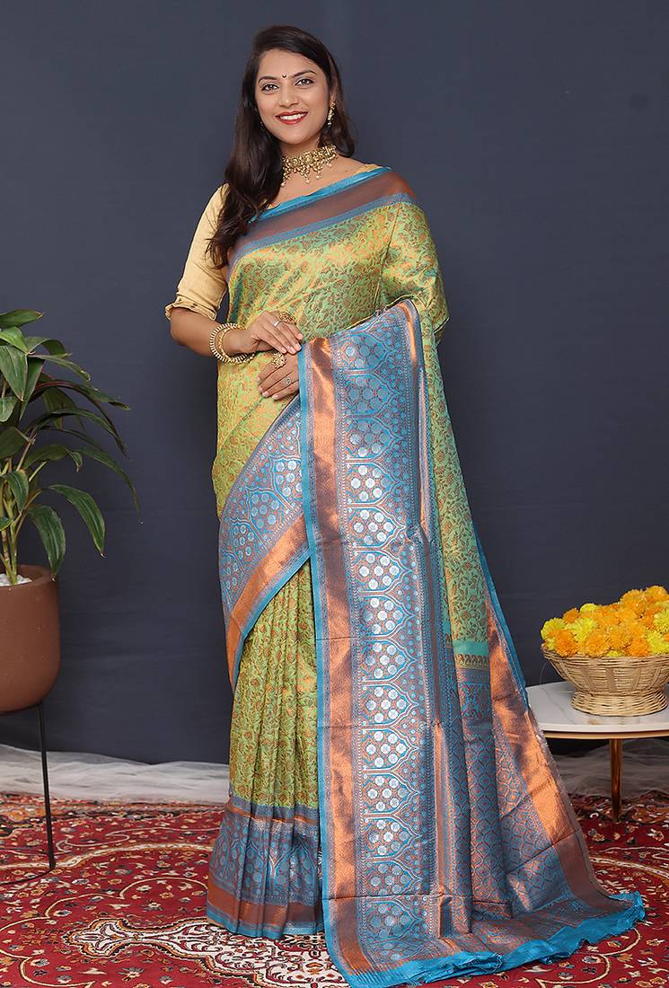 Light green banarasi silk blend saree with sky blue zari border & woven pallu