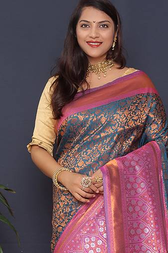 Teal blue banarasi silk blend saree with pink zari border & woven pallu