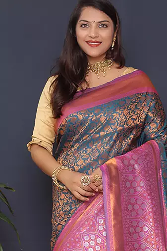 Teal blue banarasi silk blend saree with pink zari border & woven pallu