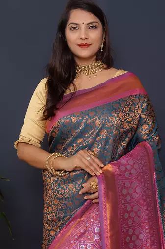Teal blue banarasi silk blend saree with pink zari border & woven pallu