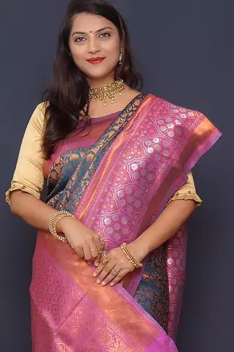 Teal blue banarasi silk blend saree with pink zari border & woven pallu