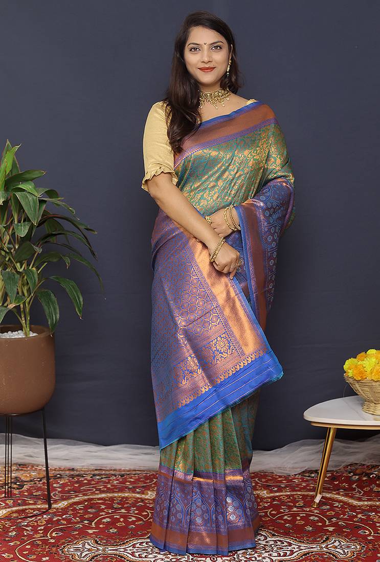 Olive green banarasi silk blend saree with blue zari border & woven pallu