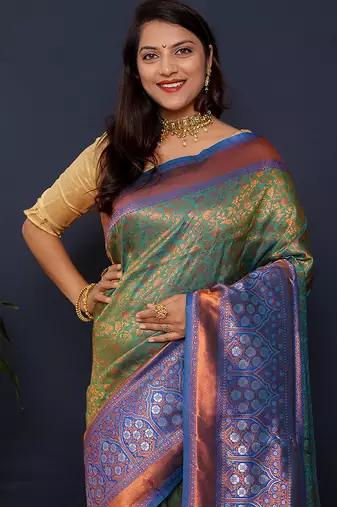 Olive green banarasi silk blend saree with blue zari border & woven pallu