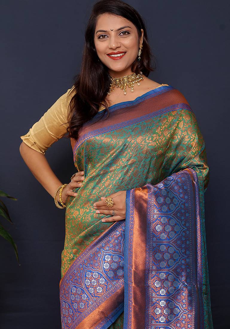Olive green banarasi silk blend saree with blue zari border & woven pallu