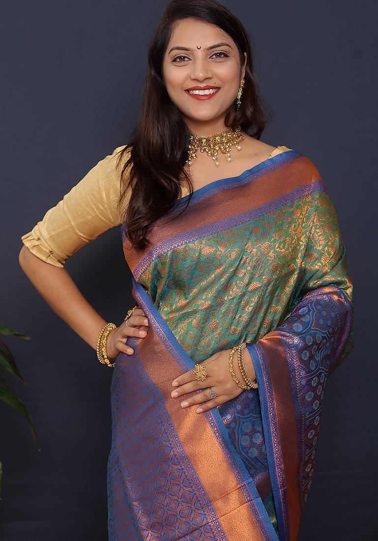 Olive green banarasi silk blend saree with blue zari border & woven pallu