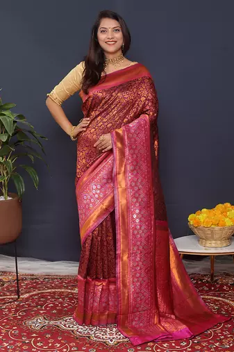 Wine banarasi silk blend saree with rani pink zari border & woven pallu