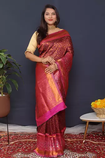 Wine banarasi silk blend saree with rani pink zari border & woven pallu