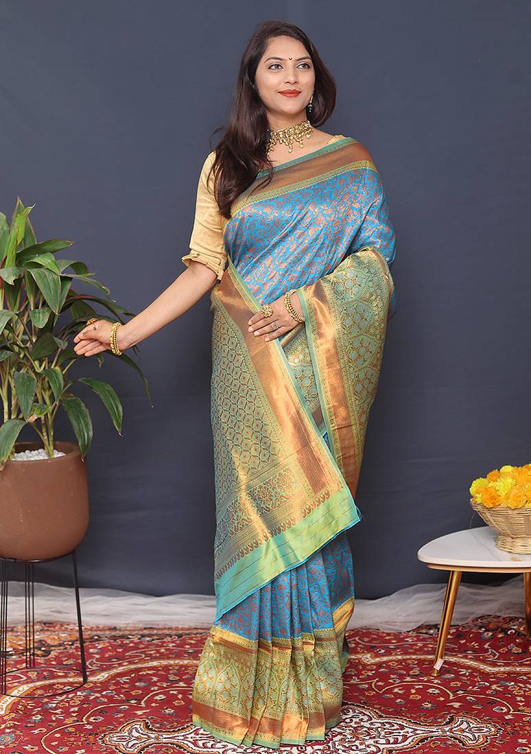 Sky blue banarasi silk blend saree with mint green zari border & woven pallu
