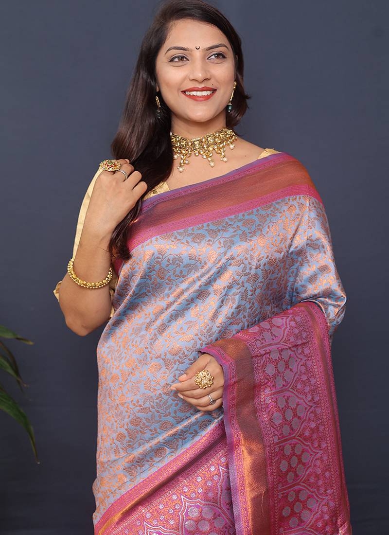 Greyish blue banarasi silk blend saree with pink zari border & woven pallu