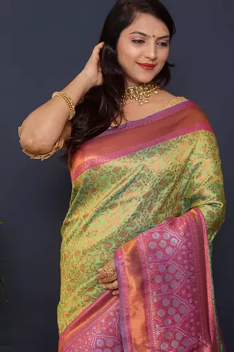 Lime green banarasi silk blend saree with mauve pink zari border & woven pallu