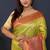 Parrort green banarasi silk blend saree with peach pink zari border & woven pallu
