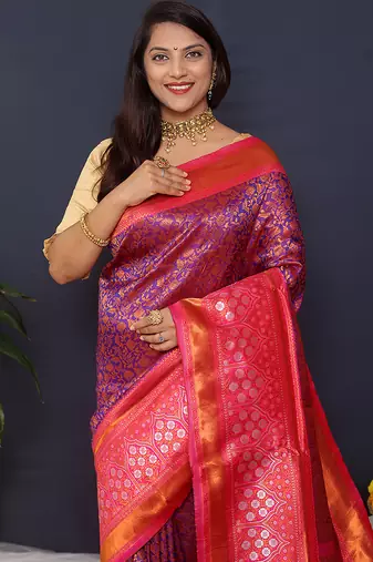 Purple banarasi silk blend saree with rani pink zari border & woven pallu