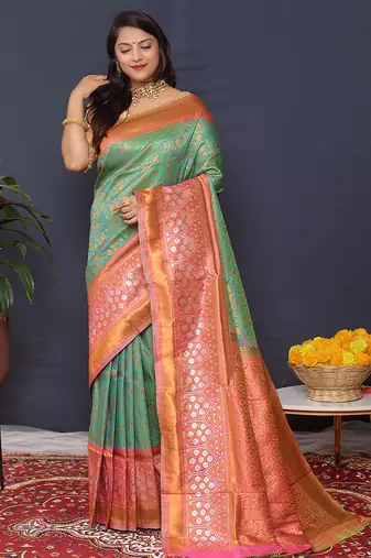 Sea green banarasi silk blend saree with coral  pink zari border & woven pallu