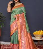 Sea green banarasi silk blend saree with coral  pink zari border & woven pallu