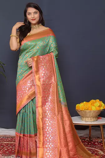 Sea green banarasi silk blend saree with coral  pink zari border & woven pallu