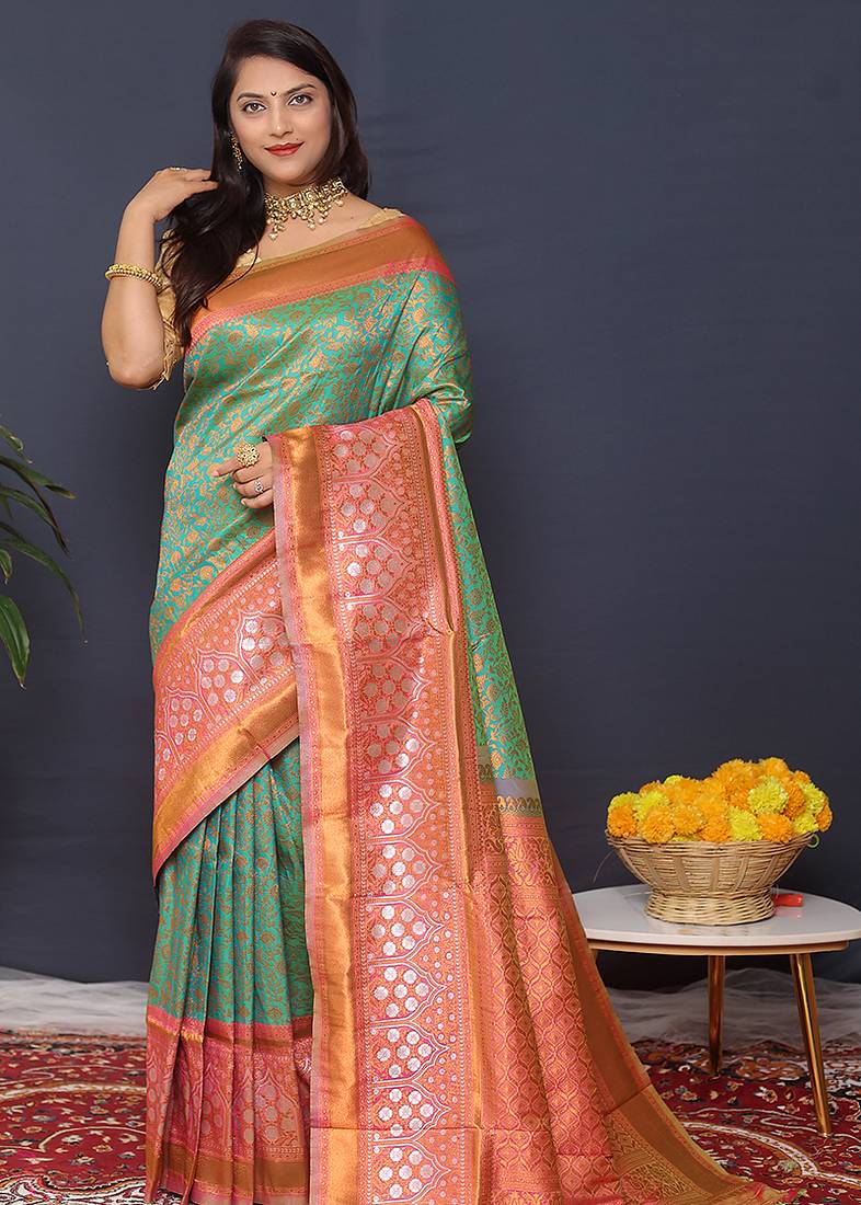 Sea green banarasi silk blend saree with coral  pink zari border & woven pallu