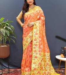 Orange banarasi silk blend saree with multi-color meenakari floral border
