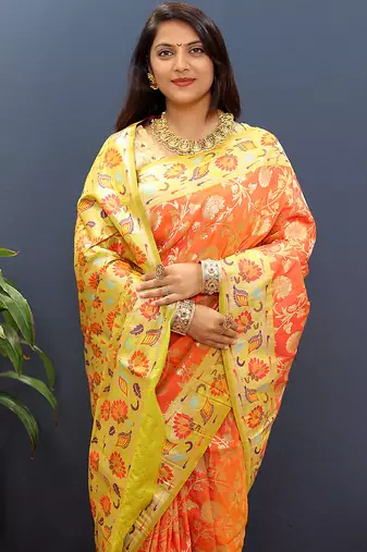Orange banarasi silk blend saree with multi-color meenakari floral border