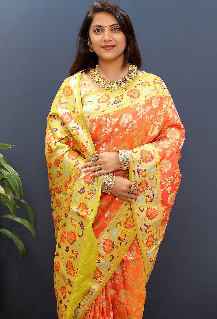Orange banarasi silk blend saree with multi-color meenakari floral border