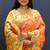Orange banarasi silk blend saree with multi-color meenakari floral border