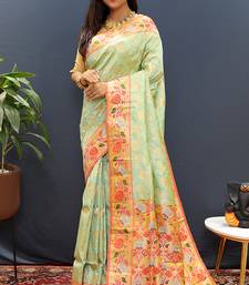 Mint green banarasi silk blend saree with multi-color meenakari floral border