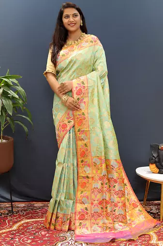 Mint green banarasi silk blend saree with multi-color meenakari floral border