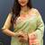 Mint green banarasi silk blend saree with multi-color meenakari floral border