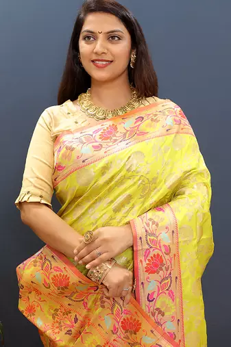 Yellow banarasi silk blend saree with multi-color meenakari floral border