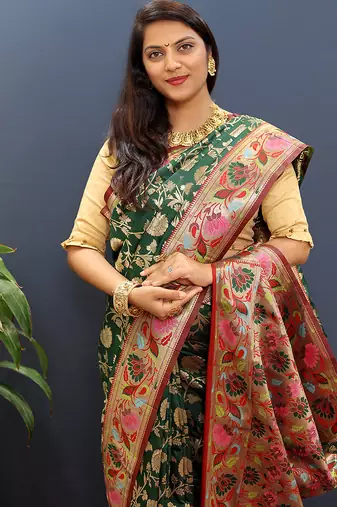 Dark green banarasi silk blend saree with multi-color meenakari floral border